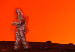 Photographer Carsten Peter walks in a volcano
