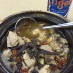 bowl of chicken soup with beer