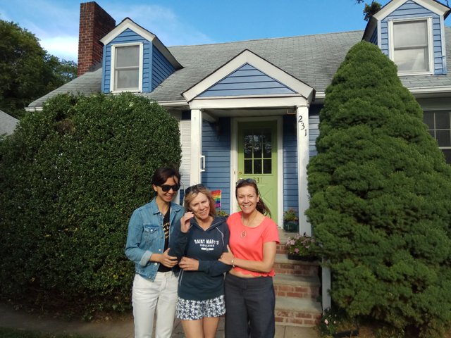 My wife, mother, and aunt, in front of the house